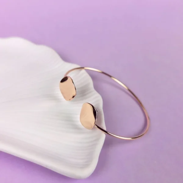 Glimmering charm rose-gold bracelet