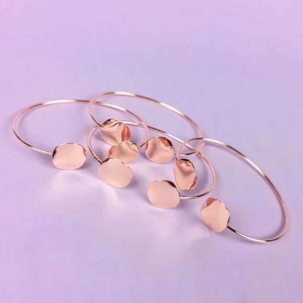 Glimmering Charm rose-gold bracelet