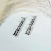 Silver U link dangle drop earrings