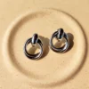 Lovely links silver stud earrings
