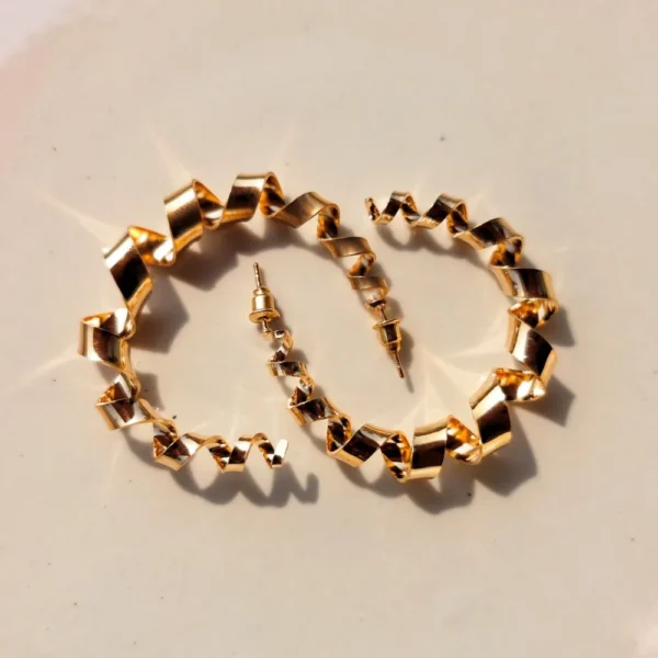 Golden illusion hoop earrings