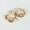 Golden legend hoop earrings