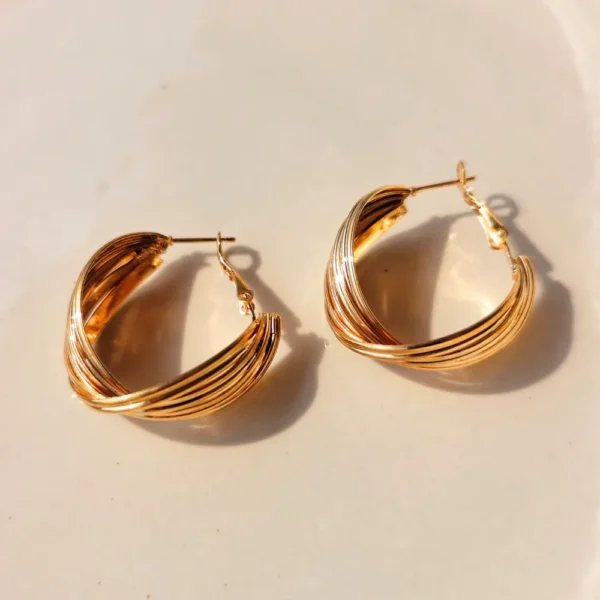 Golden legend hoop earrings