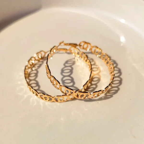 Golden starlight hoop earrings