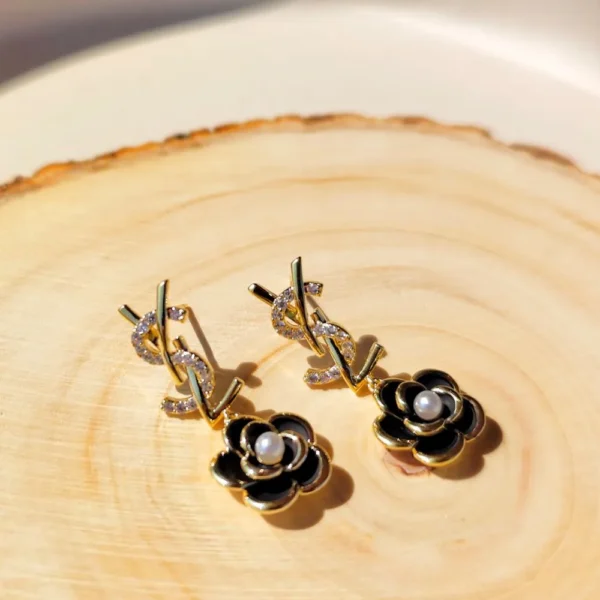YSL black enigma studs earrings