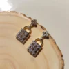 Lock and luxe studs earrings