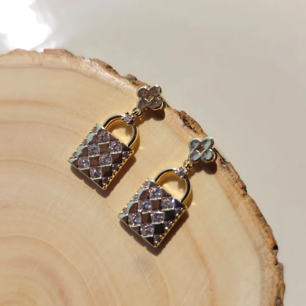 Lock and luxe studs earrings