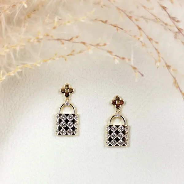 Lock and luxe studs earrings