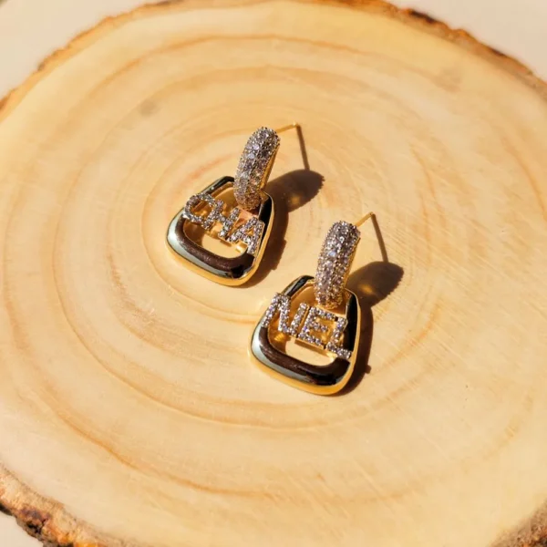 Golden CHANEL studs earrings