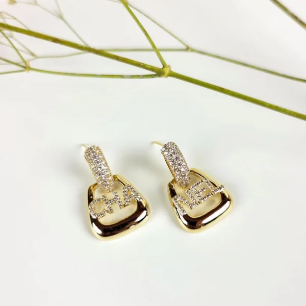 Golden CHANEL studs earrings