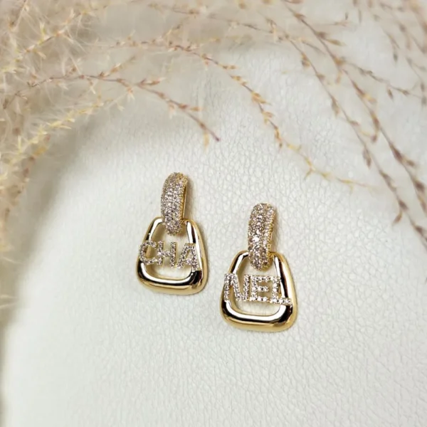 Golden CHANEL studs earrings