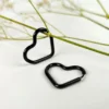 Onyx heart hoops earrings