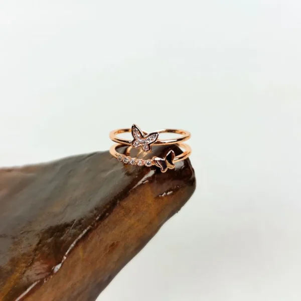 Blush winged adjustable finger ring
