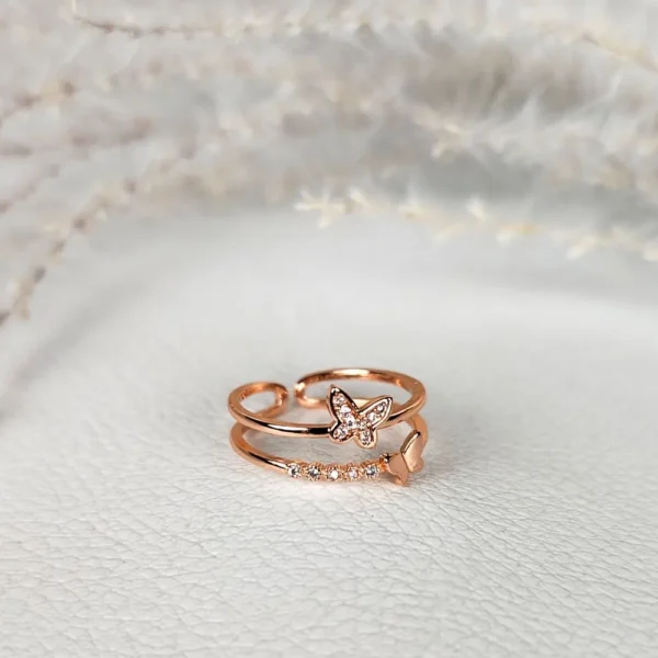 Blush winged adjustable finger ring