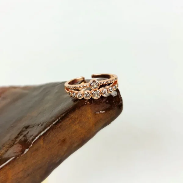 Radiant rose adjustable finger ring