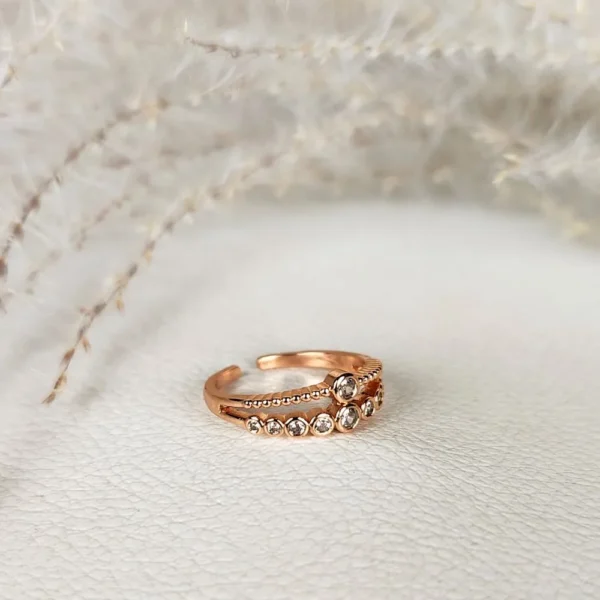 Radiant rose adjustable finger ring