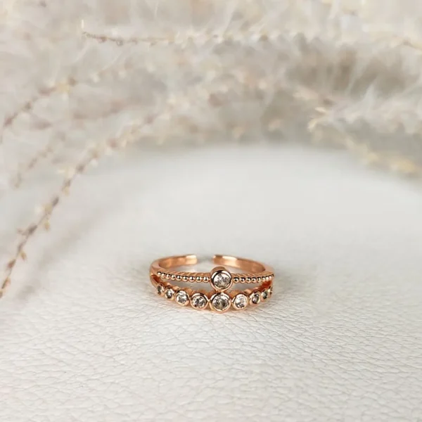 Radiant rose adjustable finger ring