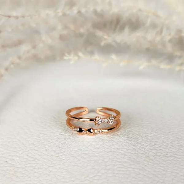 Bow embrace adjustable finger ring