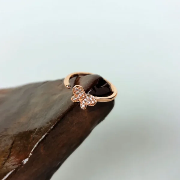 Rose glider adjustable finger ring