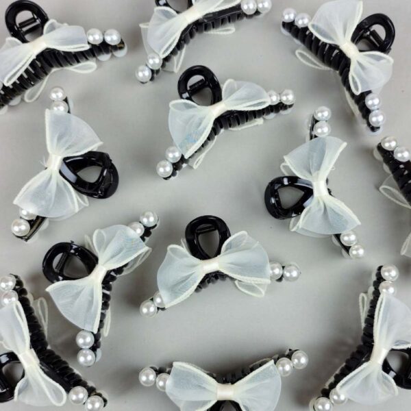 Snow bow knot hair claw clip