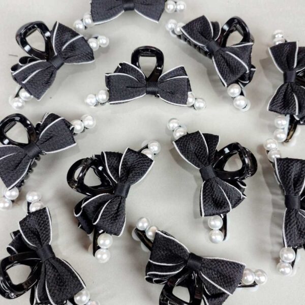 Sable bow knot hair claw clip