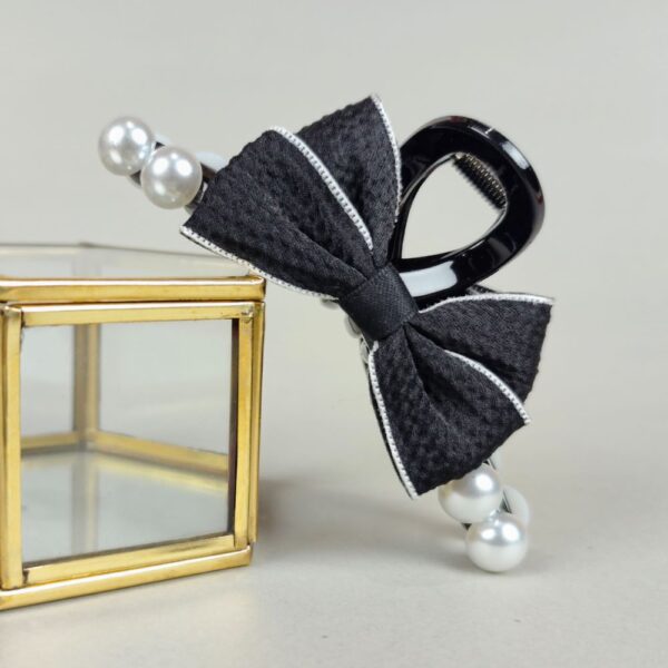 Sable bow knot hair claw clip
